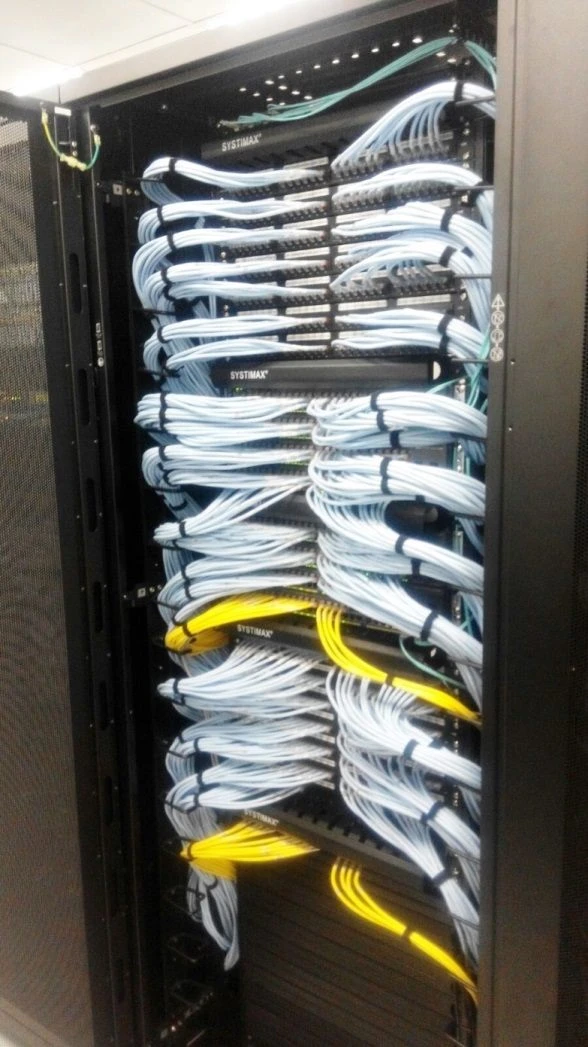EDISON network cabinet with organised patch cords
